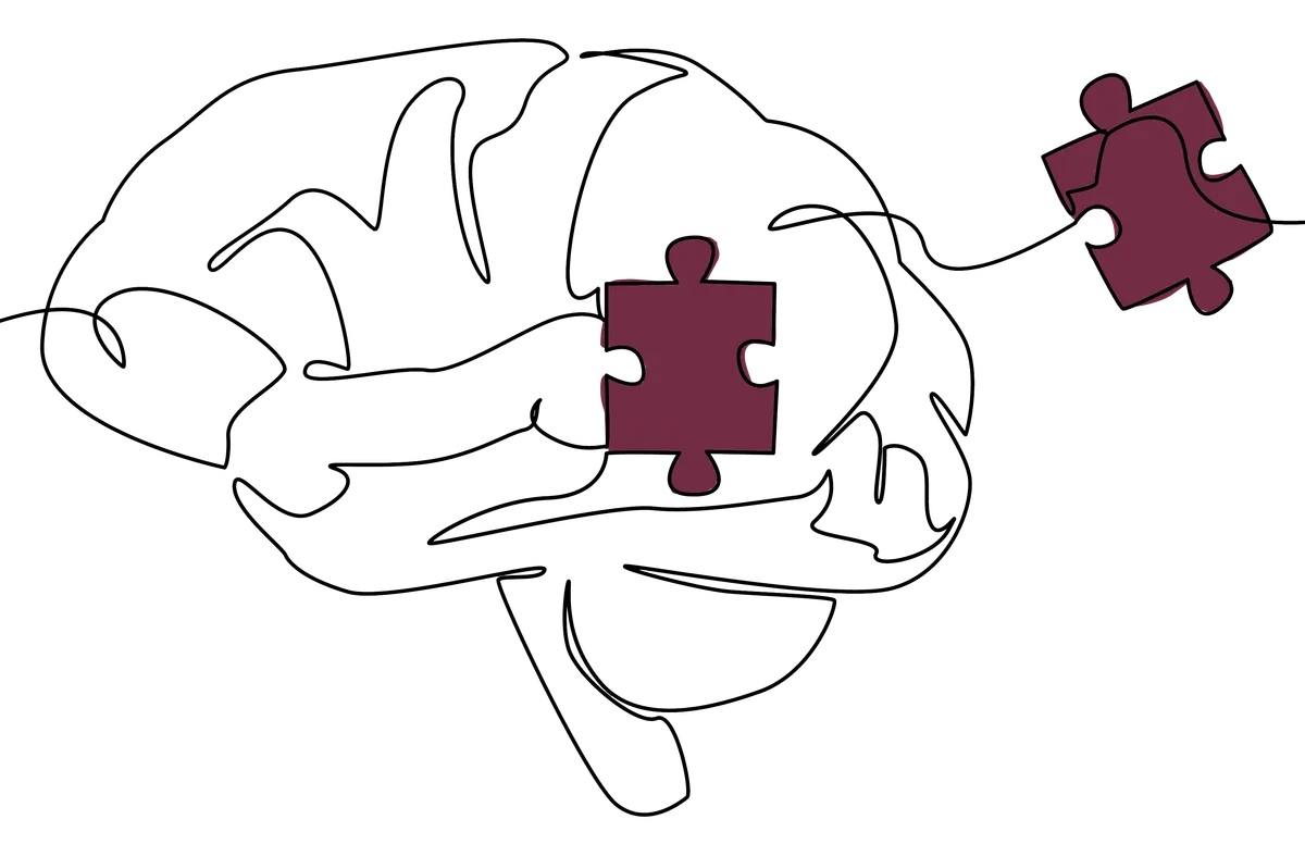 Line drawing of a brain with puzzle pieces being placed in it